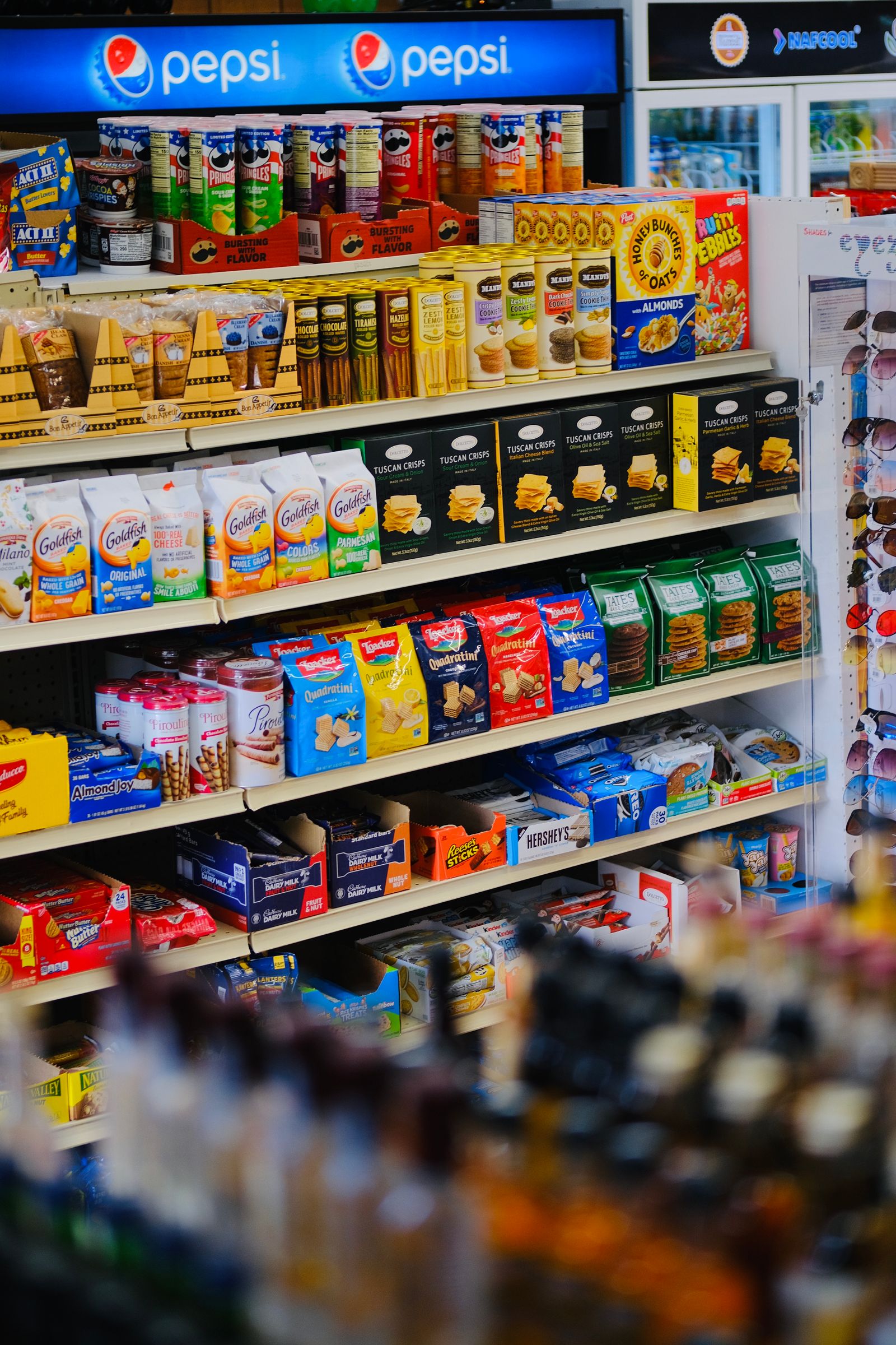 Stock photograph of boxed snacks, cereals and packaged candy on retail shelves